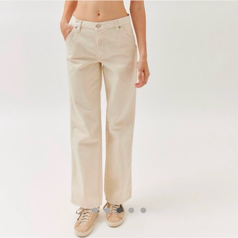 Cream colored straight leg jeans by BDG

Size 24
